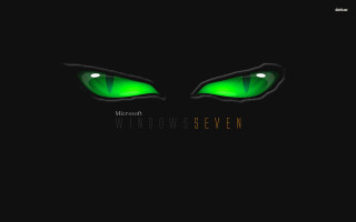 Green eyes glowing black background - green eye free wallpaper
