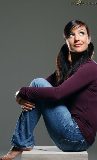 Woman sitting concrete pose portrait - adrienn henczné deák free wallpaper
