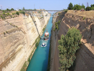 Boat narrow river bridge canyon - blunt border free wallpaper