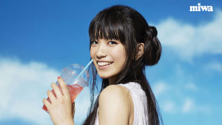 Woman holding plastic cup straw - a straw free wallpaper