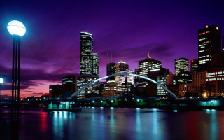 City skyline bridge river night 48 - a purple sky in the background free wallpaper