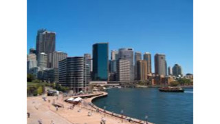 City skyline river boat people - synchromism free wallpaper