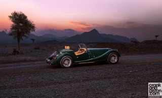Green car desert sunset tree - a dirt road in the desert free wallpaper