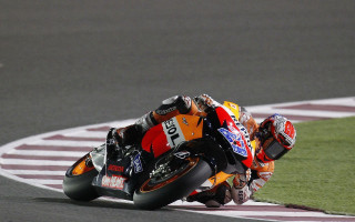 Motorcycle leaning curve track grass - dynamic camera angle free wallpaper