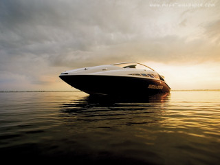 Boat sunset cloudy sky water - cinematic free wallpaper for desktop