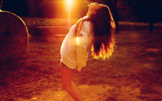 Woman field hair wind sun - sunlight free wallpaper