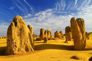 Rocks desert blue sky clouds - a group of rocks free wallpaper