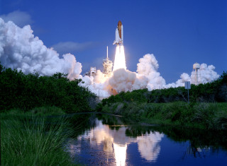 Rocket taking off sky clouds - a rocket free wallpaper