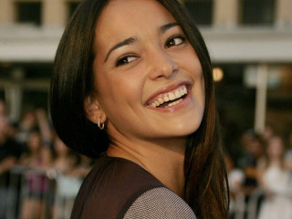 Woman smiling crowd building background - a building in the background free wallpaper