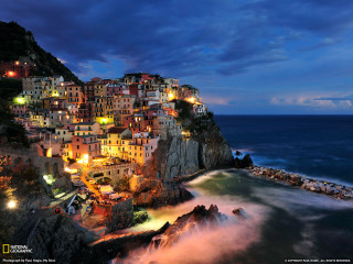 Town cliff ocean night lights - evgeny lushpin free wallpaper