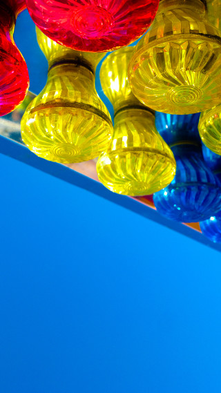 Colorful glass objects hanging store - color free wallpaper