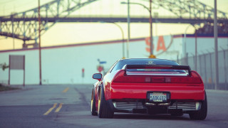 Red car parked road bridge - widescreen free wallpaper