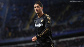 Man black uniform playing soccer - photo real free wallpaper