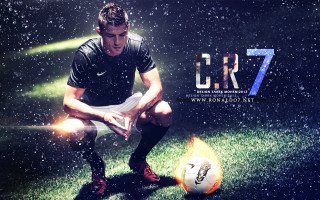 Man kneeling soccerball fireball poster - a soccer ball free wallpaper
