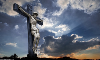 Statue man cross sky background - a statue of a man free wallpaper