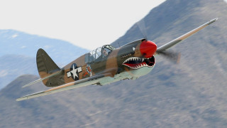 Fighter plane shark mouth flying - the side of its free wallpaper