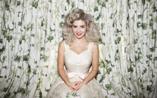 Woman smiling blonde rococo flower - a chair in front free wallpaper