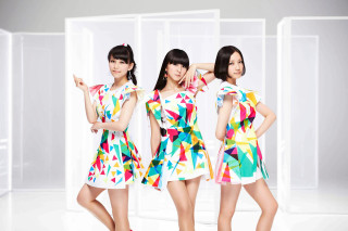 Three asian women colorful dresses - white wall free wallpaper