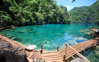 Wooden walkway blue lake trees - a blue lake free wallpaper