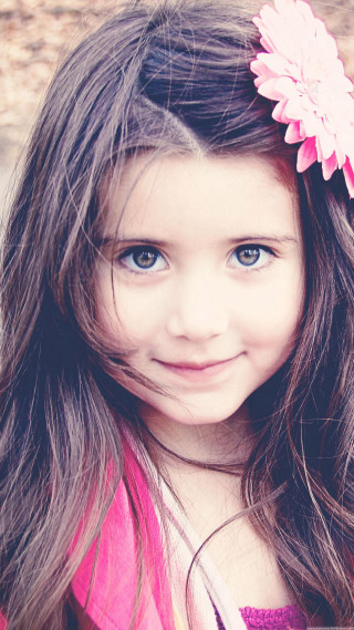 Little girl smiling camera pink - a little girl free wallpaper