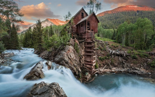 Wooden structure mountain river waterfall - a waterfall below free wallpaper