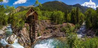 Wooden structure rock river mountains - a stream free wallpaper