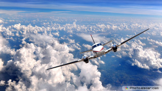 Small airplane flying above clouds 2 - gear free wallpaper