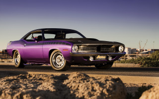 Purple car parked road rocks - a purple car free wallpaper