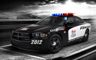 Police car parking lot cloudy 2 - a police car free wallpaper