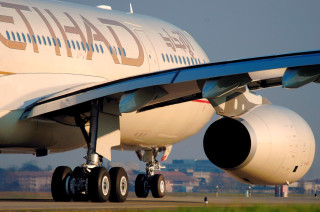 Large jet runway sky buildings - a large passenger free wallpaper