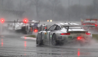 Racecar wetroad rain redlight motionblur - impressionist free wallpaper