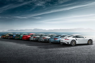 Cars parking lot ocean mountains - serial free wallpaper
