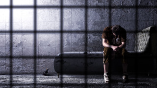 Person sitting bench room jail - a person free wallpaper