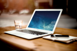 Laptop wooden table glass water 2 - a laptop computer free wallpaper for desktop
