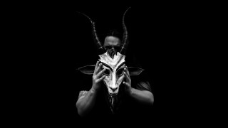 Man holding mask horned animal - bedwyr williams free wallpaper