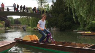 Man riding bike boat river - a photo free wallpaper