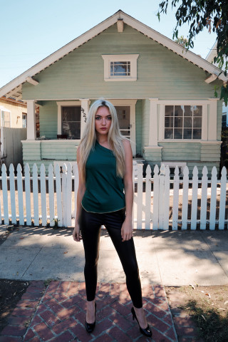 Woman standing house white picket - free vintage wallpaper