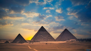 Three pyramids desert sunset clouds 2 - a sunset in the background free wallpaper