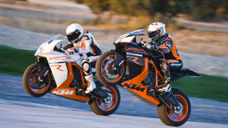 Motorcycle race sunshine track leaning - two person free wallpaper