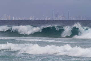 Large wave city skyline ocean - skyscraper free wallpaper