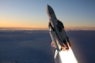Space shuttle flying sky light - a space shuttle free wallpaper