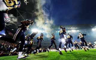 Football players night field lights - dave kendall free wallpaper