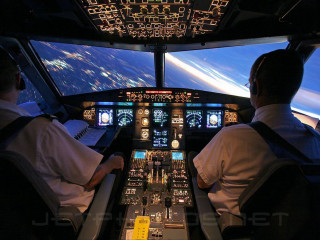 Cockpit pilots night city lights - the screen free wallpaper