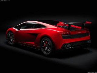 Red sports car dark room 16 - a red sports car free wallpaper