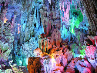 Colorful cave lights walls ceiling - a cave free wallpaper
