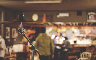 Drum set person background person - a tilt shift photo free wallpaper