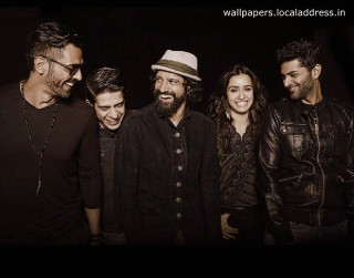 Group smiling camera black background - don arday free wallpaper