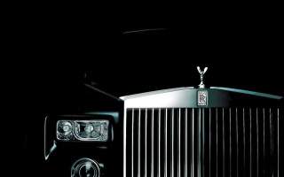 Car grill headlights dark background - a white light free wallpaper