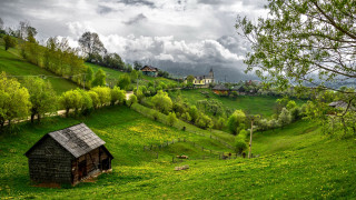 Cabin green field cloudy sky - a small cabin free wallpaper