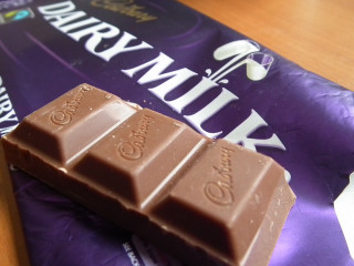 Milk chocolate table bag sitting - top of a table next free wallpaper